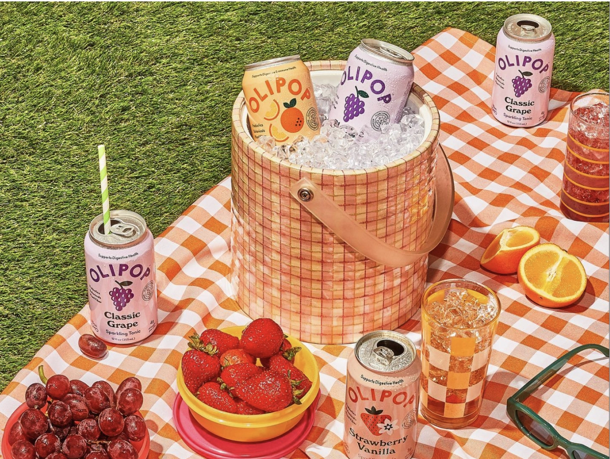 picnic setting with Olipop cans