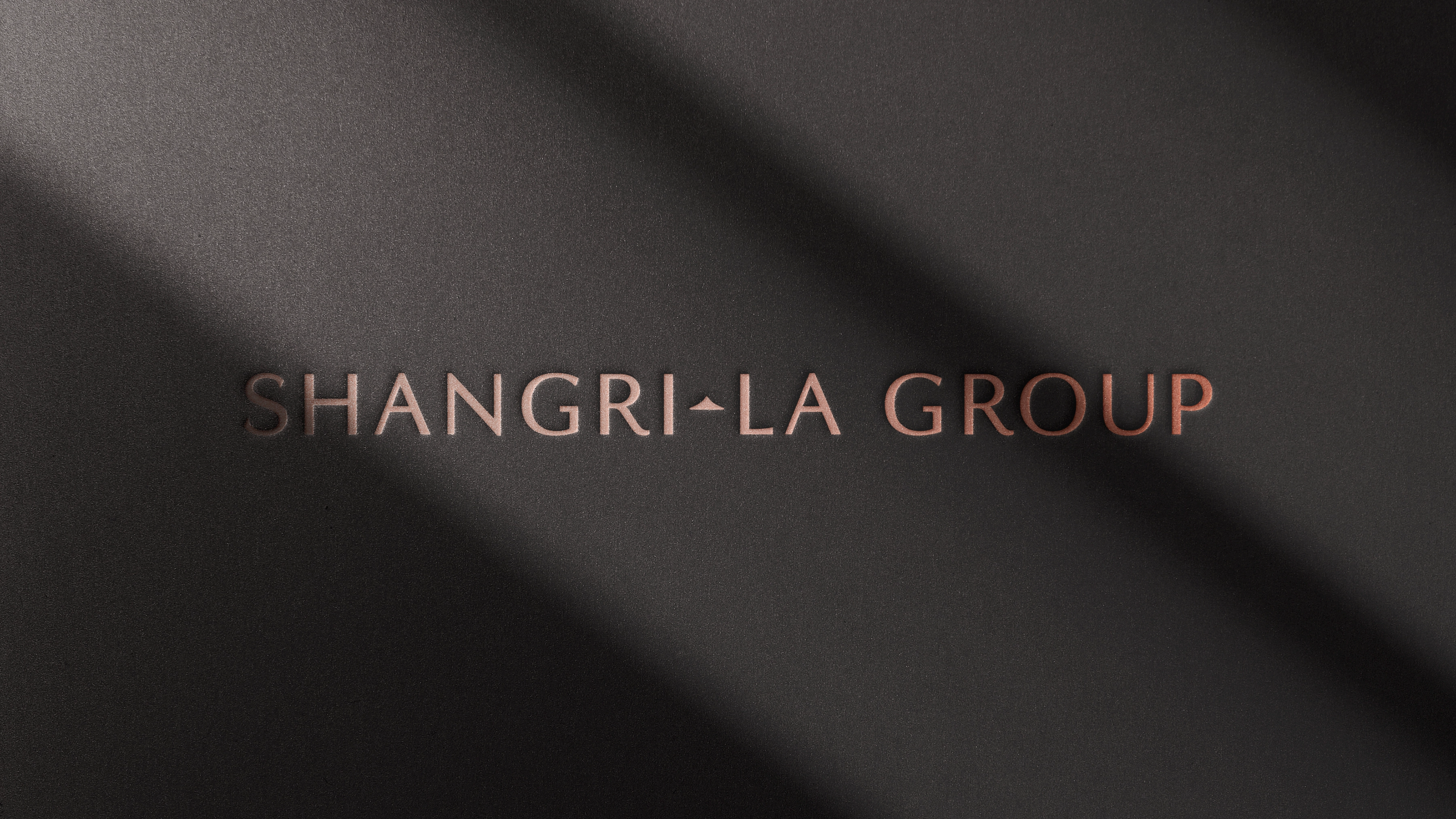 shangri-la group name with black background