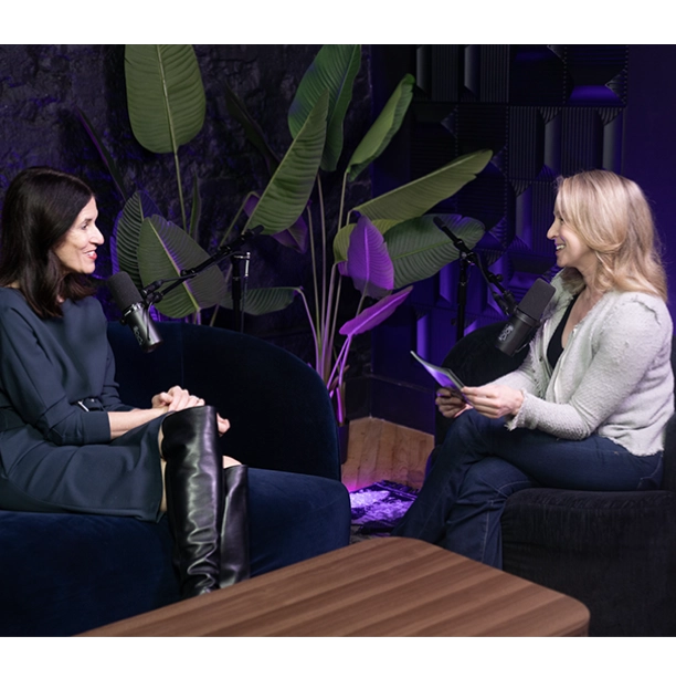 heather stern and Michelle Peluso talking during episode interview